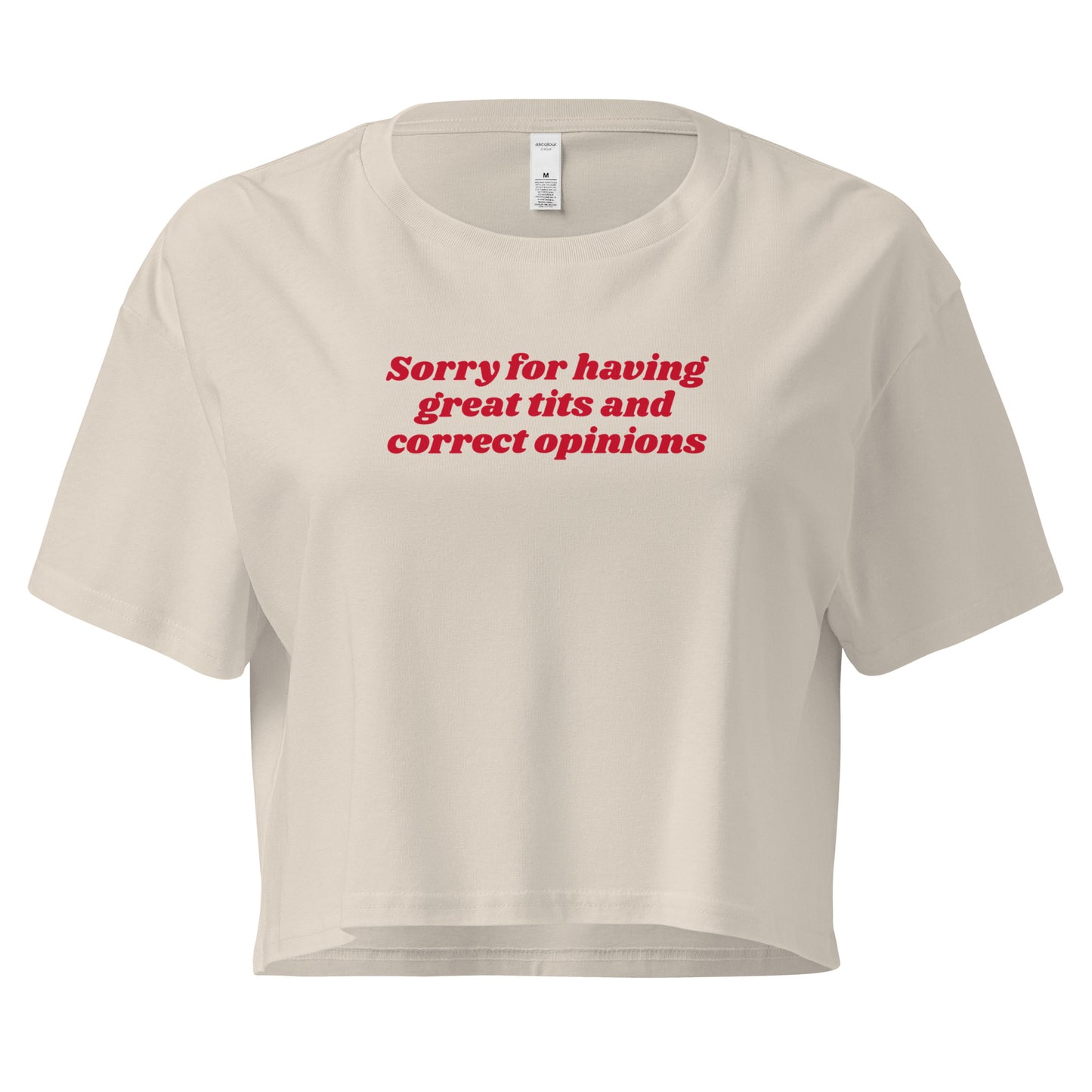 Bone crop t-shirt with the text 'Sorry for having great tits and correct opinions' printed in red on the front.