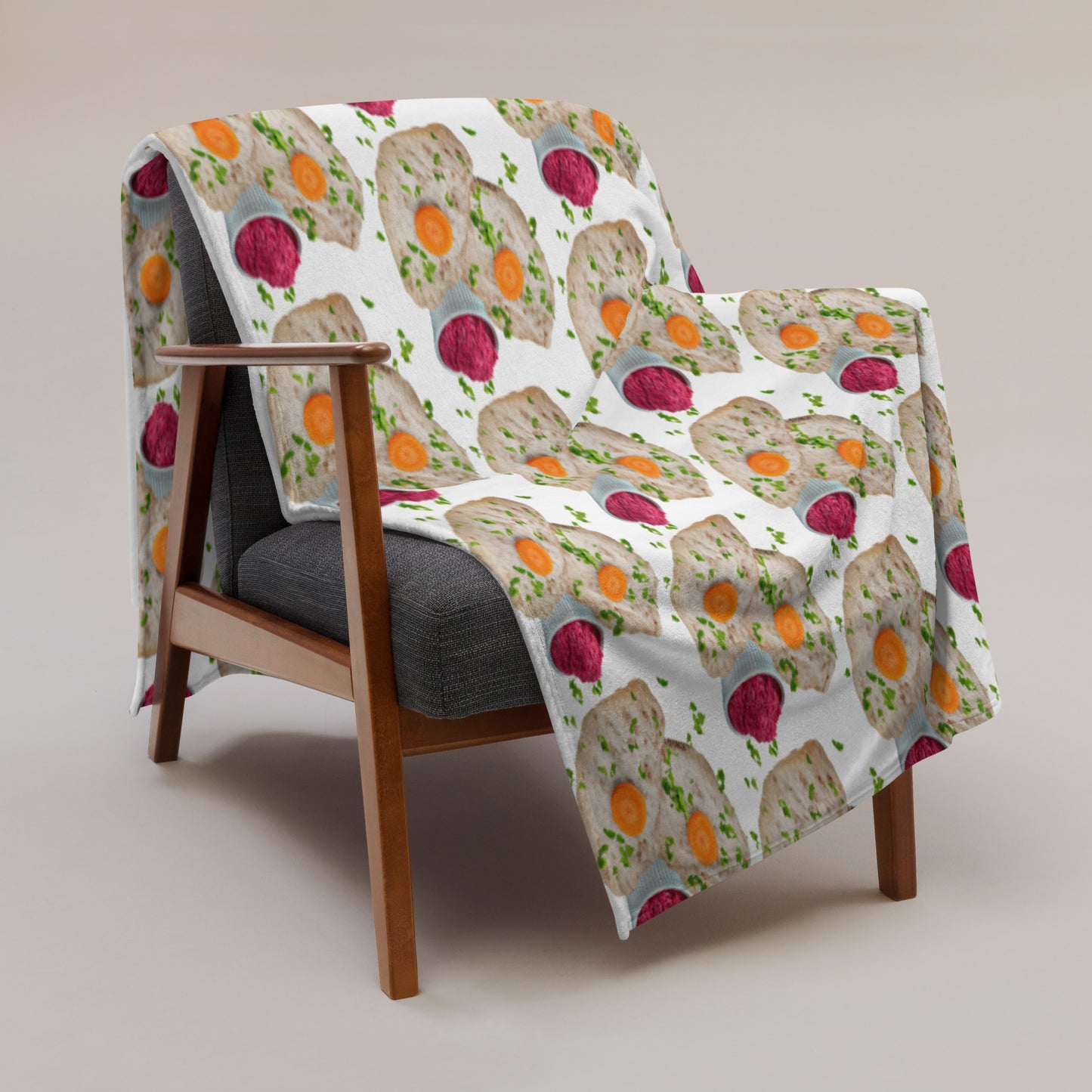Gefilte Fish Blanket hanging on chair - Wrap yourself in comfort and culture with this cozy gefilte fish throw blanket. This quirky blanket is perfect for your couch or a funny gift for a Jewish foodie.