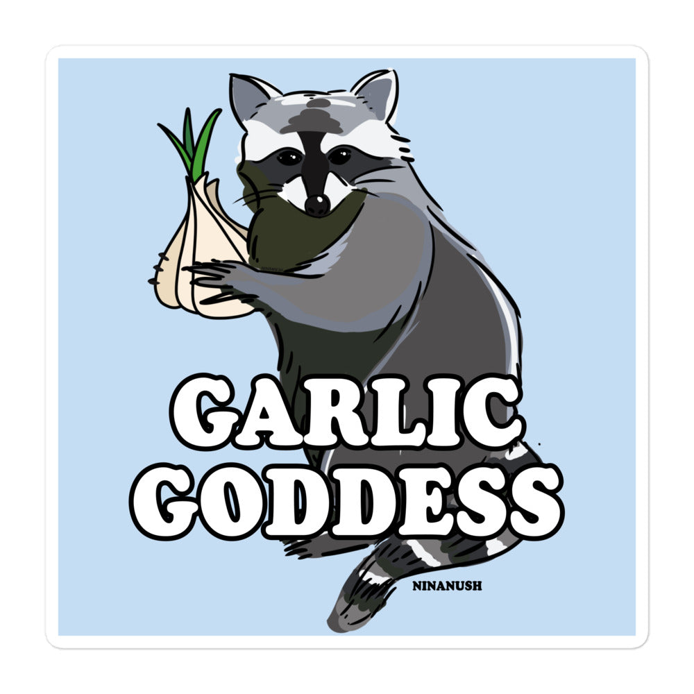Do you love garlic? Looking for a funny gift for a raccoon lover? Introducing the Garlic Goddess Raccoon Vinyl Sticker! Designed for passionate garlic enthusiasts, this funky garlic goddess sticker features a totally unique naughty raccoon design holding a head of garlic and the words "garlic goddess" in bold letters. It's an original hand drawn design by Nina and it's made just for you.