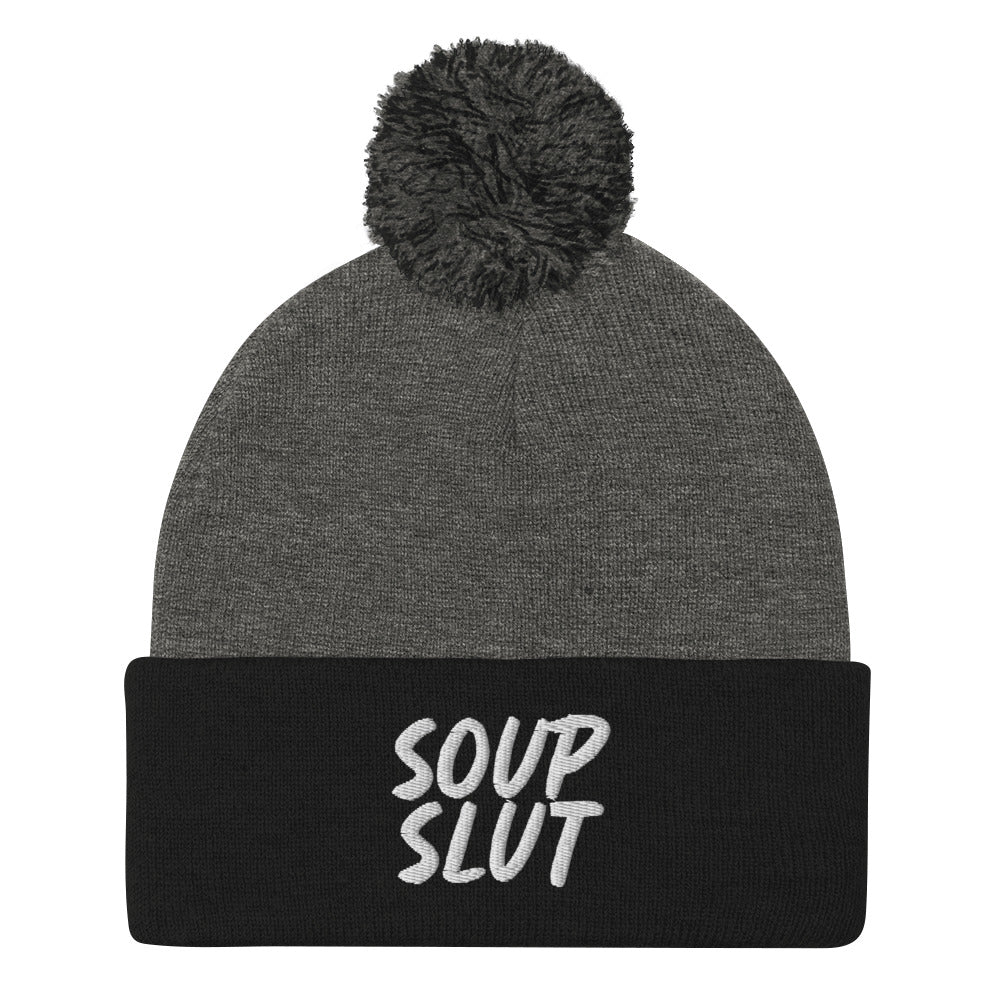 Gray and Black Soup Slut Beanie from Nina's Funky Shop by ninanush - Do you love soup? Looking for a fun gift for a foodie? This warm and cozy, embroidered pom pom beanie is just what you need. Celebrate your favorite foods in style with this funny foodie Beanie with "soup slut" expertly embroidered on the front. Perfect for soup lovers and foodies of all kinds.
