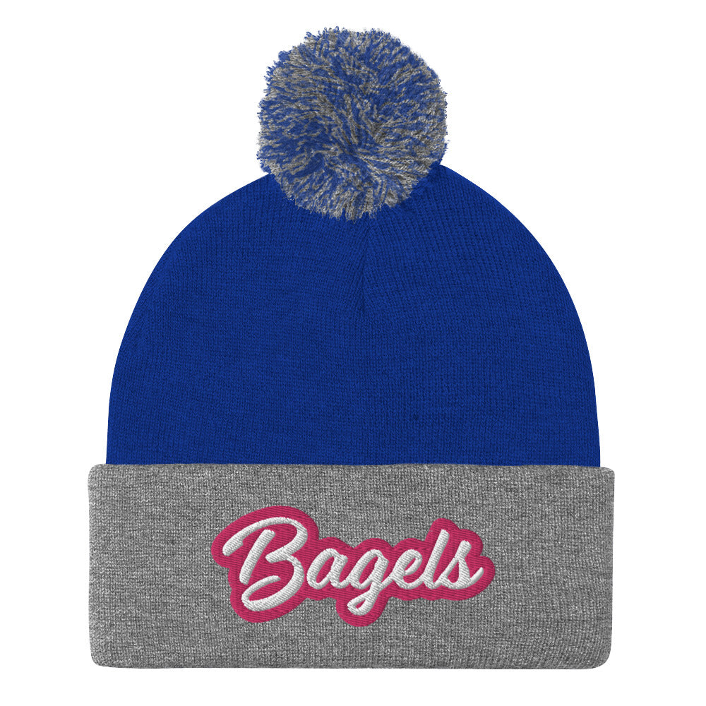 Blue and gray beanie for bagel lovers with pink writing - Calling all bagel babes! Stay warm and make a statement in our pink and white embroidered beanie for bagel lovers. This funny foodie hat stands out and comes in a variety of colors. It's a unique bagel beanie that's comfortable and made just for you. Eat bagels in style or give it as a funny gift for bagel enthusiasts.