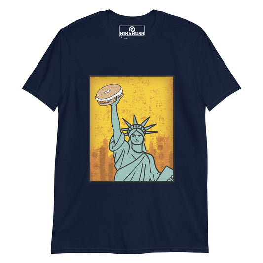 Navy blue bagel shirt - Funky Statue of Liberty T-shirt. Eat bagels in style in a funny food t-shirt for bagel lovers. It's a colorful graphic tee with a totally unique hand drawn design of the Statue of Liberty holding a bagel. It's just what every bagel enthusiast needs. Make a statement or give it as a funny gift for bagel lovers.