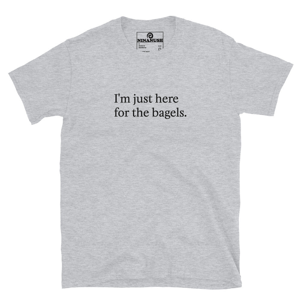 Gray bagel lover t-shirt - "I'm just here for the bagels." This bagel enthusiast t-shirt is a comfortable classic tee with a funny bagel quote on the front. Make a statement and eat bagels in this weird shirt for bagel lovers and foodies of all kinds. Great for everyday streetwear or a gift for your favorite bagel antisocial lover enthusiast. Celebrate your favorite foods in our funky foodie clothing and accessories.