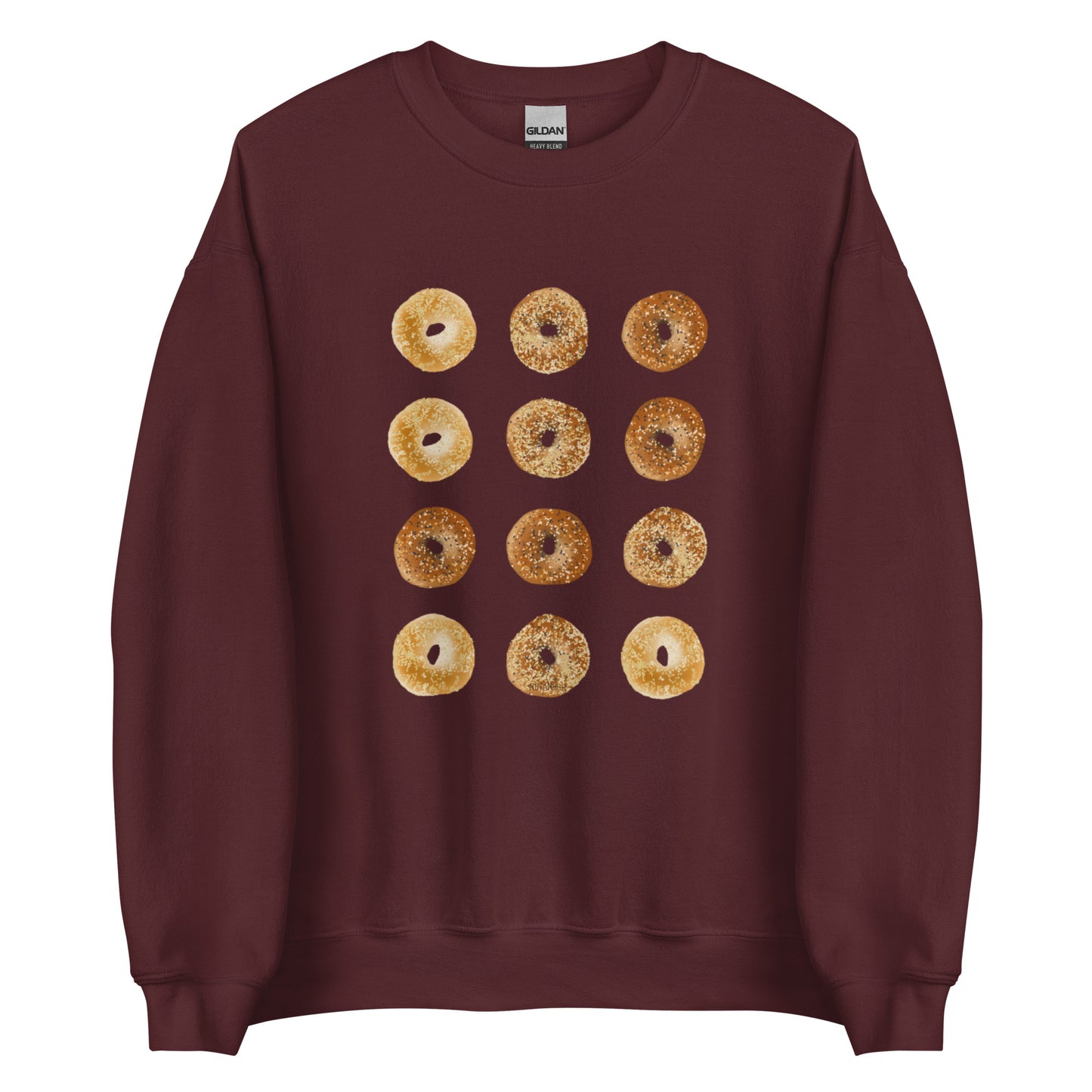 Maroon Bagels Crewneck Sweatshirt from Nina's Funky Shop by ninanush - Our Bagels Sweatshirt is soft, comfortable and a perfect foodie sweatshirt for bagel lovers. It's a unisex, classic crew neck sweatshirt that comes in a variety of colors with a dozen bagels, expertly printed on the front. Perfect for cozy nights in or stand out streetwear for foodies, this sweatshirt is hand drawn, designed by Nina and made just for you.