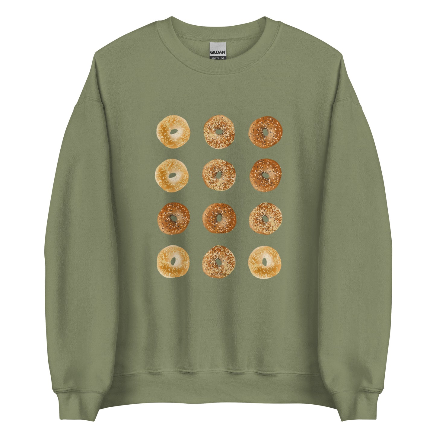 Army Green Bagels Crewneck Sweatshirt from Nina's Funky Shop by ninanush - Our Bagels Sweatshirt is soft, comfortable and a perfect foodie sweatshirt for bagel lovers. It's a unisex, classic crew neck sweatshirt that comes in a variety of colors with a dozen bagels, expertly printed on the front. Perfect for cozy nights in or stand out streetwear for foodies, this sweatshirt is hand drawn, designed by Nina and made just for you.
