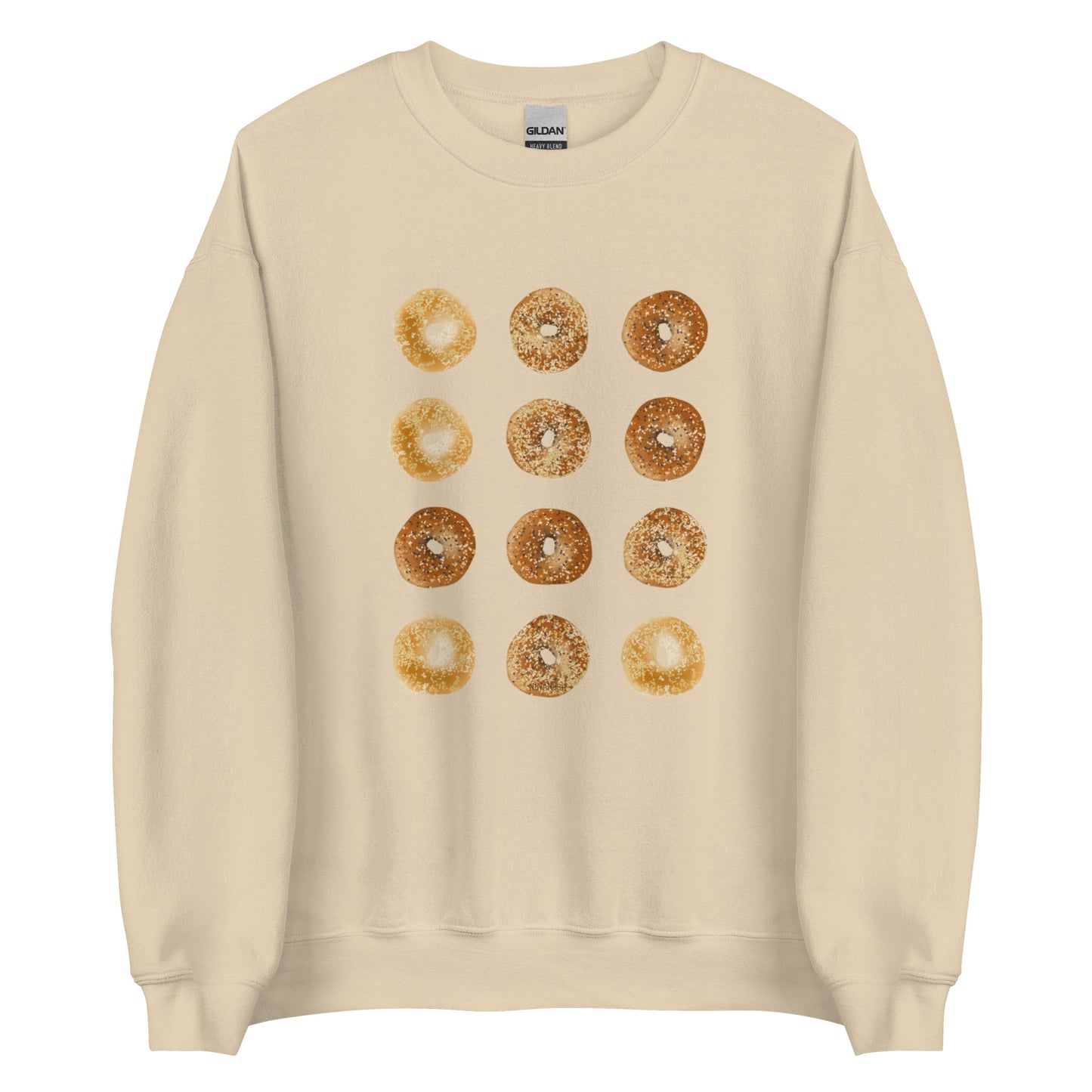Beige Bagels Crewneck Sweatshirt from Nina's Funky Shop by ninanush - Our Bagels Sweatshirt is soft, comfortable and a perfect foodie sweatshirt for bagel lovers. It's a unisex, classic crew neck sweatshirt that comes in a variety of colors with a dozen bagels, expertly printed on the front. Perfect for cozy nights in or stand out streetwear for foodies, this sweatshirt is hand drawn, designed by Nina and made just for you.