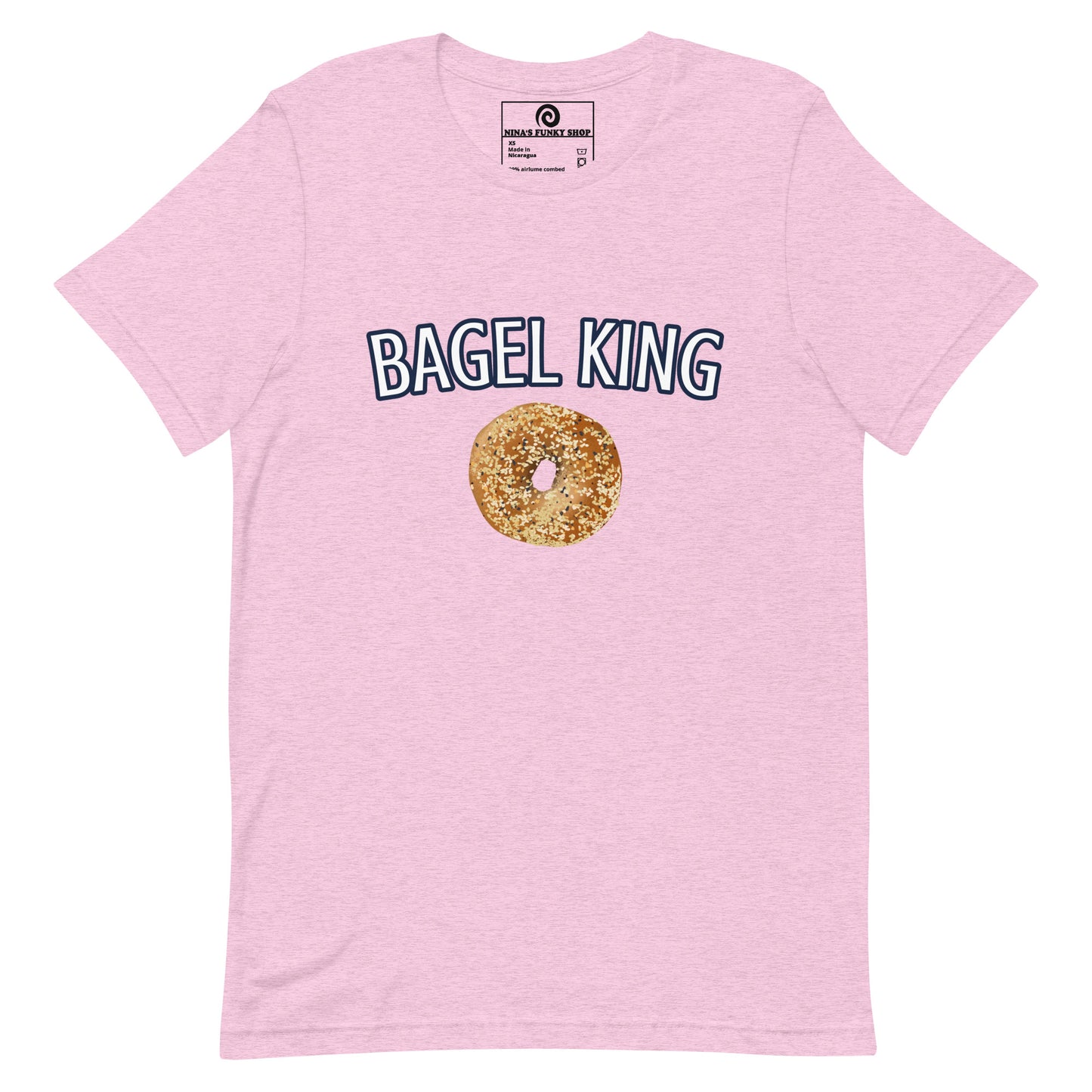 Bagel King Pink Everything Bagel T-shirt - Calling all bagel kings and queens! Looking for your new favorite shirt? A Gift for a fellow bagel enthusiast? This bagel t-shirt comes in a variety of colors with "bagel king" and a hand drawn everything bagel design, on the front. The perfect graphic tee for bagel lovers and foodies of all kinds.