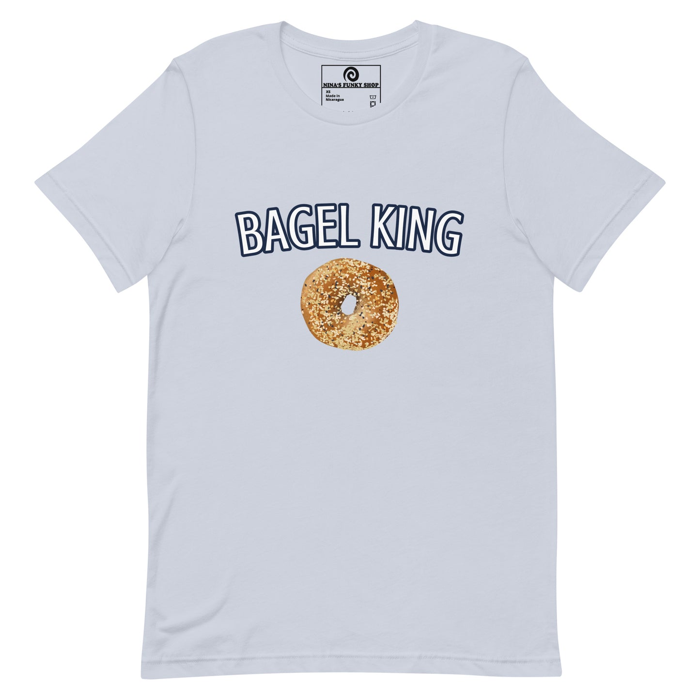 Light Blue Everything Bagel T-shirt - Calling all bagel kings and queens! Looking for your new favorite shirt? A Gift for a fellow bagel enthusiast? This bagel t-shirt comes in a variety of colors with "bagel king" and a hand drawn everything bagel design, on the front. The perfect graphic tee for bagel lovers and foodies of all kinds.