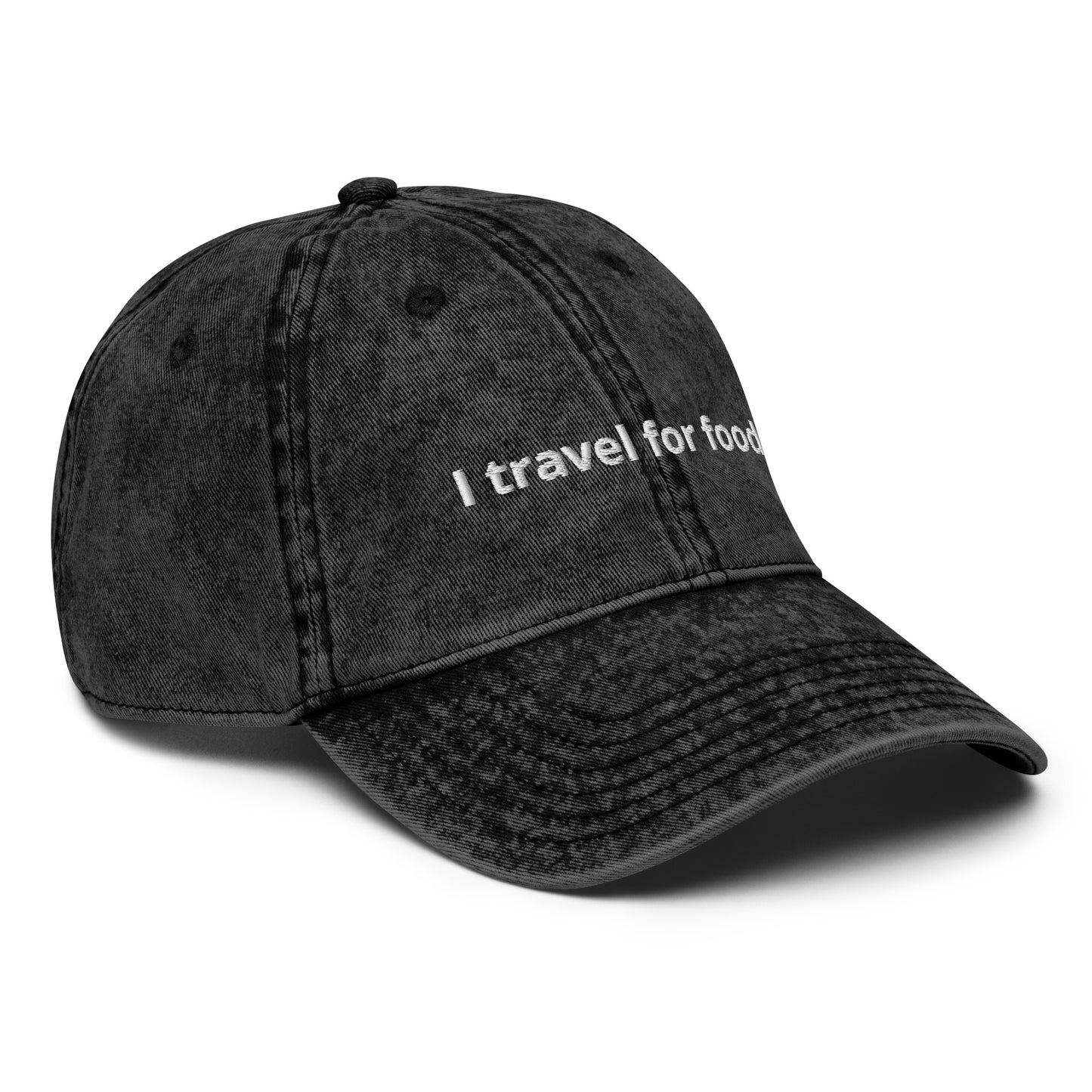 Black I Travel For Food Hat - $1000 flight to Thailand for $2 pad Thai? Yes please! Our "I travel for food" hat is comfortable and has an adjustable closure. It comes in a variety of colors with a funny travel saying for foodies, expertly embroidered on the front. This dad hat is perfect for travelers and foodies alike.