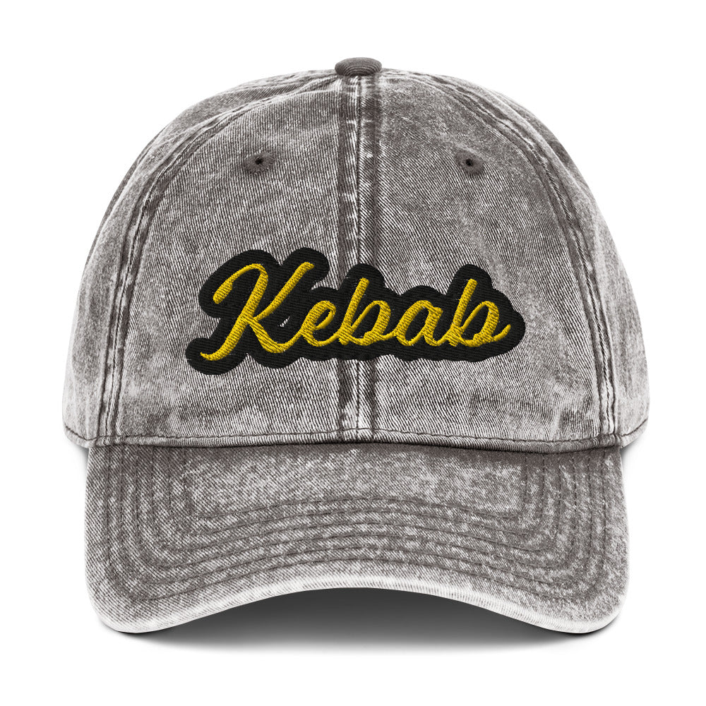 Gray kebab dad hat - This kebab dad hat, made of cotton, is designed for kebab enthusiasts. The hat showcases a washed-out cotton material with vintage-style embroidery. It's the ideal funny food hat for both kebab lovers and Middle Eastern foodies. This kebab hat is a unique, statement accessory for foodies or gift for kebab aficionados.