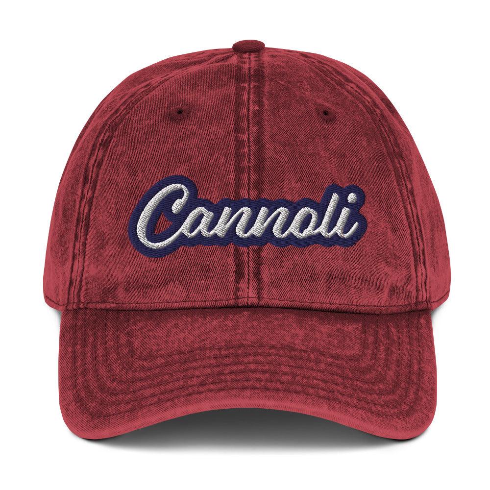 Maroon cannoli hat - A unique dad can designed for cannoli lovers and foodies. Eat your favorite cannoli in style and show off your love for this classic Italian dessert in our unique foodie dad hat. This cannoli hat is has a washed out vintage style and a white and blue embroidery. Perfect for cannoli lovers and foodies of all kinds.