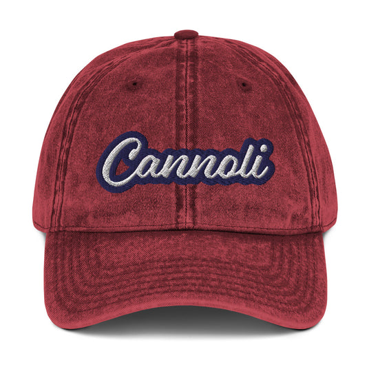 Maroon cannoli hat - A unique dad can designed for cannoli lovers and foodies. Eat your favorite cannoli in style and show off your love for this classic Italian dessert in our unique foodie dad hat. This cannoli hat is has a washed out vintage style and a white and blue embroidery. Perfect for cannoli lovers and foodies of all kinds.