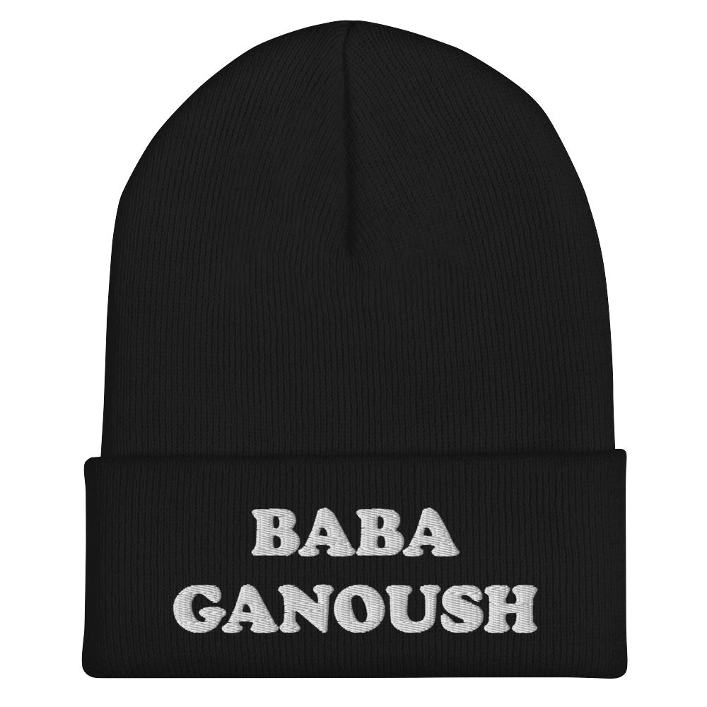 Middle Eastern food hat in black with white embroidery - Eat baba ganoush in your new fitted baba ganoush beanie. This fitted foodie beanie has white embroidery of a classic middle eastern dish. It's a funny and unusual hat for foodies and baba ganoush enthusiasts. Love hummus? Falafel? Shakshuka? Celebrate your favorite middle eastern foods in our weird & funky foodie hats.