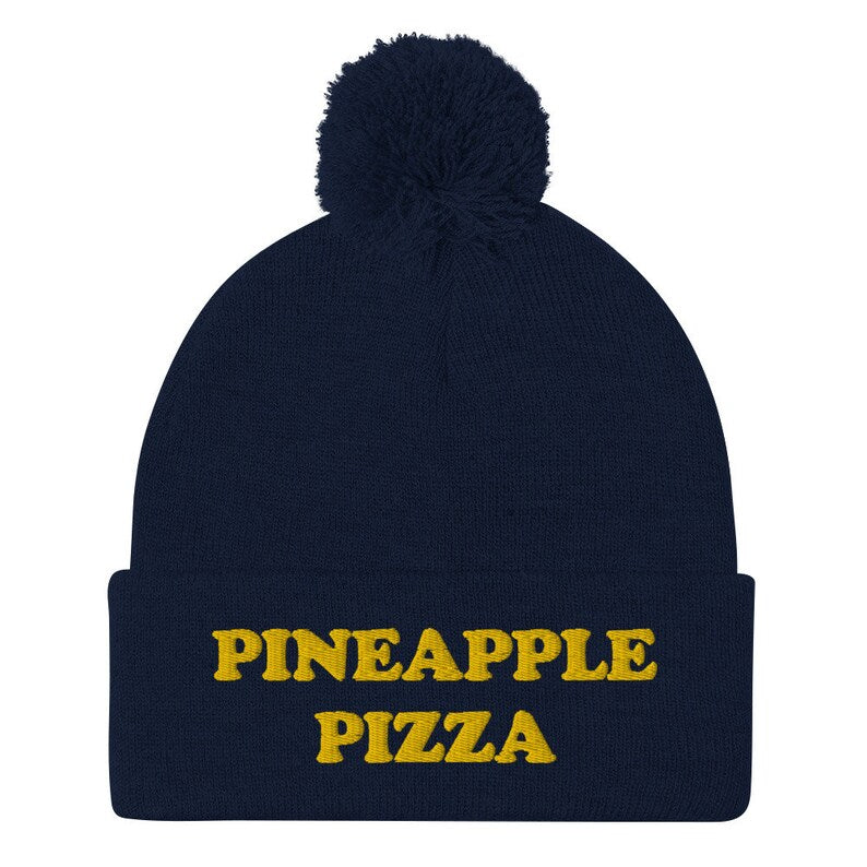 Navy blue pineapple pizza hat - Are you in the pineapple pizza club? Eat pineapple pizza in style in a funny foodie beanie for pizza lovers. It's a unisex embroidered beanie for pineapple pizza enthusiasts. If you love pineapple pizza, this weird foodie hat is a must have or give this warm and cozy hat as a funny gift for pineapple pizza people.