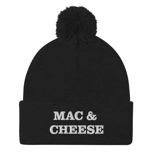 How much do you love mac and cheese? This "Mac and Cheese" beanie is a perfect warm and cozy hat for cold weather. It's a classic stylish beanie with a pom pom on top and a unique foodie embroidery. Ideal gift for people who love food and, of course mac and cheese. Shop funky and unique foodie beanies and clothing.