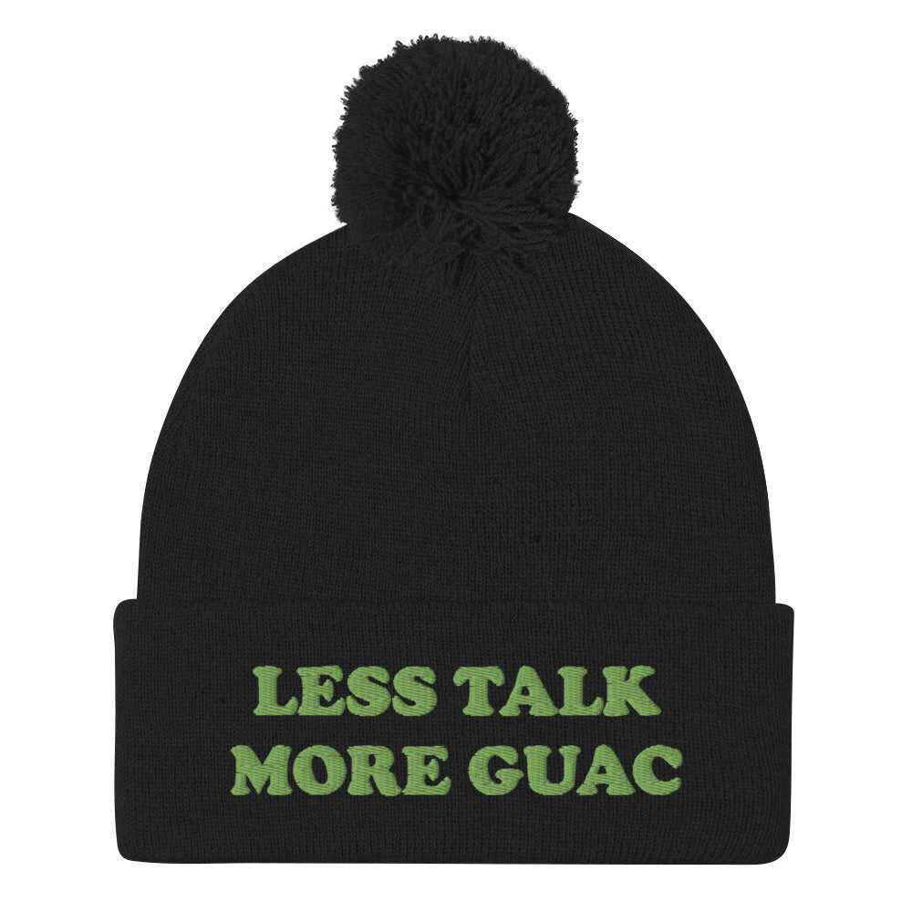 Black guacamole beanie with green emboidery. Less talk more guac! Make your priorities clear in this unique guacamole beanie hat. It's a classic pom pom beanie with a funky foodie yellow embroidery. This funny food quote hat is a perfect foodie beanie or unique gift for guacamole lovers. Now you can wear a funky guacamole quote hat and eat guacamole in style.