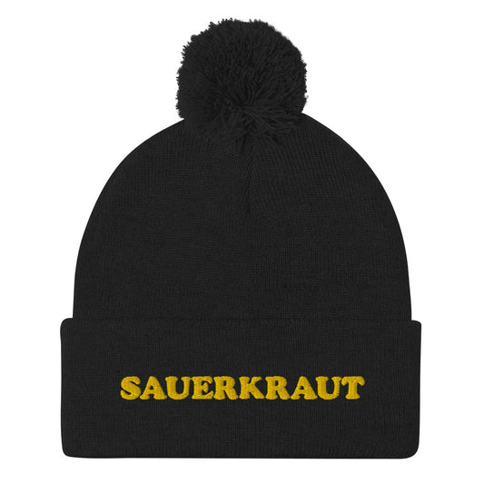 Black beanie with yellow sauerkraut embroidery - This sauerkraut beanie is a comfortable and funny hat for foodies. If you like weird beanies or you love sauerkraut, this funky food hat is just for you. Give it as a weird gift for foodies or sauerkraut enthusiasts. Stay funky in this classic funny food beanie with a pom pom on top a unique and funky yellow embroidery.