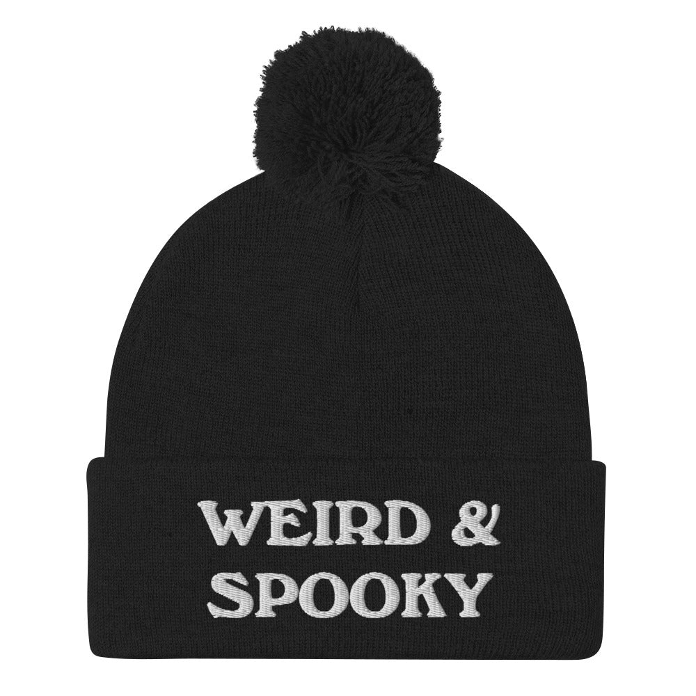 Black and white weird and spooky beanie hat - Stay weird and spooky in this classic beanie with a pom pom on top. It's cute and cozy and just a little weird. So, celebrate your weirdness and individuality in our funky clothing and accessories. Be weird, be spooky, and be yourself in these colorful and unique beanies.