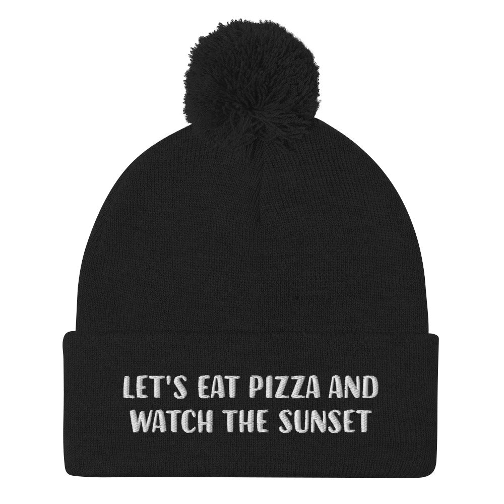 Black watch the sunset beanie for pizza lover - Let's eat pizza and watch the sunset in a unique beanie with a funny message. This cute beanie is a warm hat for cozy nights in and outdoor adventures. It's a classic unisex embroidered beanie with a pom pom on top. Love sunsets and pizza? Wear this funny foodie beanie or give it as a unique gift for pizza lovers.