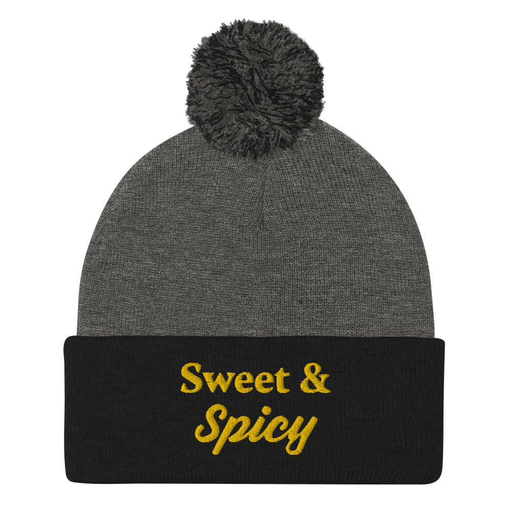 Black and gray sweet and spicy beanie - Keep your head warm and look cute too in this Sweet and Spicy Beanie! It's the perfect warm and cozy foodie hat for cold weather that will add a little personality to your everyday style. Wear it in, out on the town, or gift it to your sweet and spicy friends. It's classic beanie with a pom pom on top and a unique embroidery.