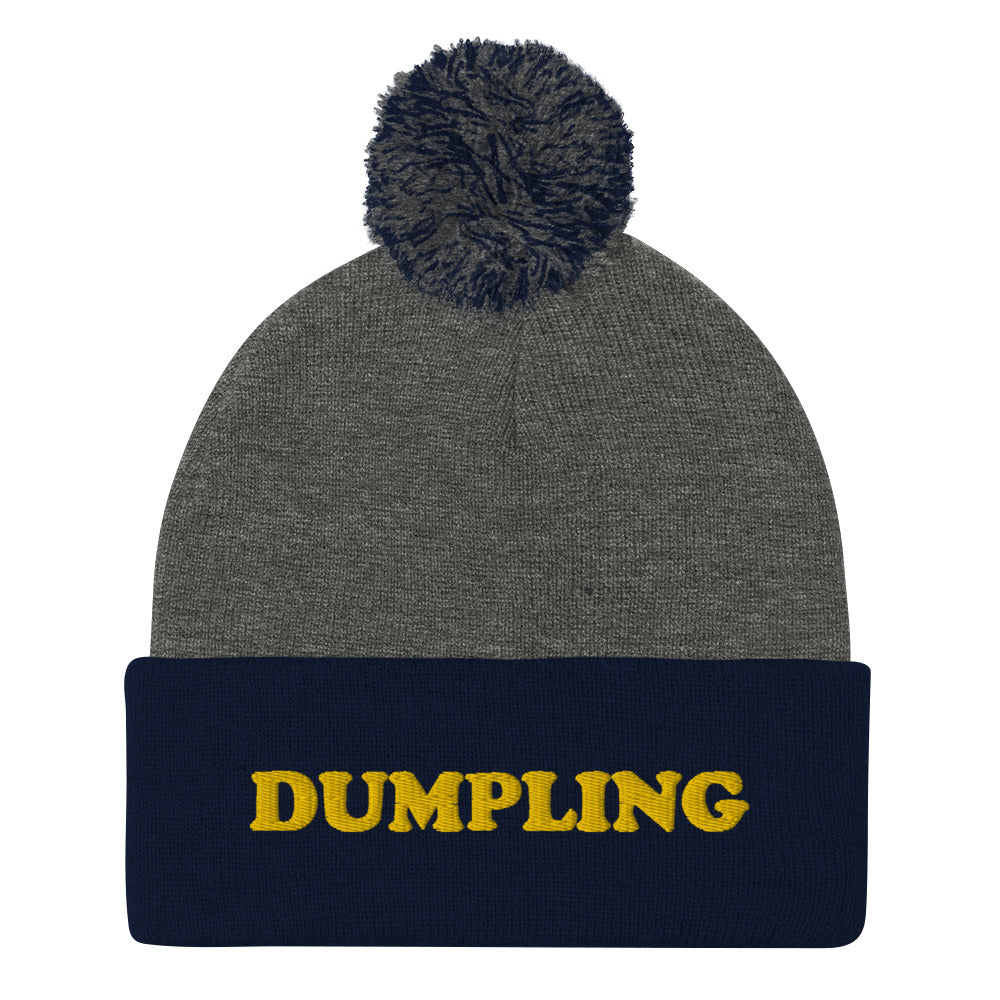 Navy blue and gray weird food beanie - Are you a dumpling enthusiast? This dumpling beanie hat is all you've been missing. Now you can eat your favorite dumplings in a unique dumpling hat with a classic pom pom on top. Stay weird and stay warm in this cozy and unusual food beanie hat. Celebrate your favorite dumplings in our funky foodie beanies & clothing.