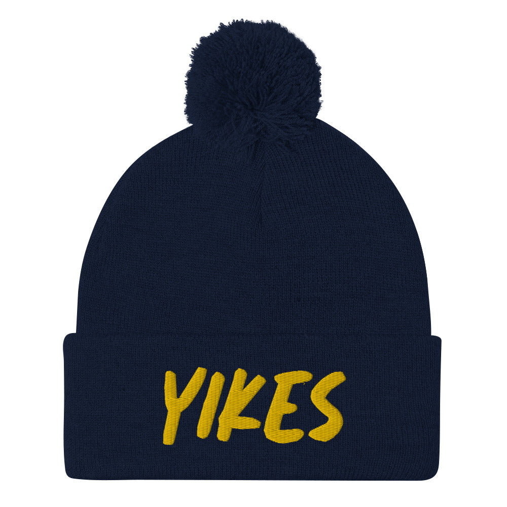 This funky yikes beanie is a unique and quirky winter hat. The yikes beanie is warm and cozy with a classic pom pom on top and a yellow "YIKES" embroidery. This funny beanie is a perfect weird gift that's unique and original. Shop funny foodie beanies, weird hats, funky vegan t-shirts, unique eco friendly hats and more.