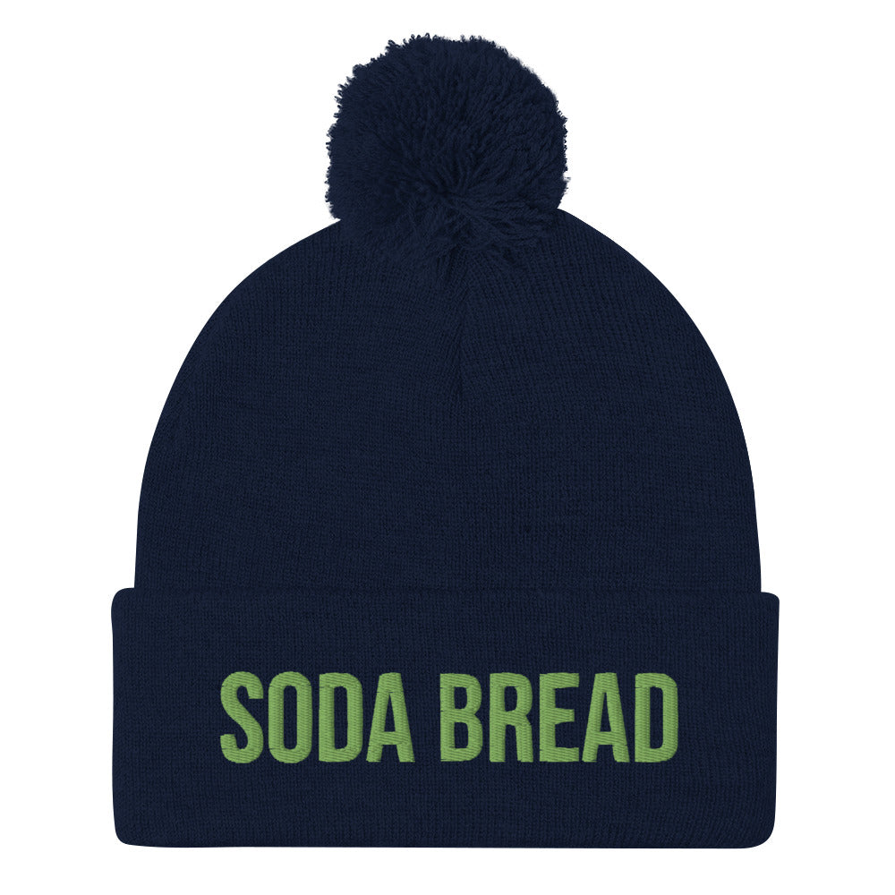 Navy blue soda bread beanie with green embroidery - Traditional Irish foodie hat - The Soda Bread Beanie is a unique food beanie that's perfect for everyday adventures, funny street wear and eating soda bread cozy at home. This weird food hat is a classic unisex embroidered beanie. Eat soda bread in style this year or give this funny foodie beanie as a gift to your favorite soda bread enthusiast.