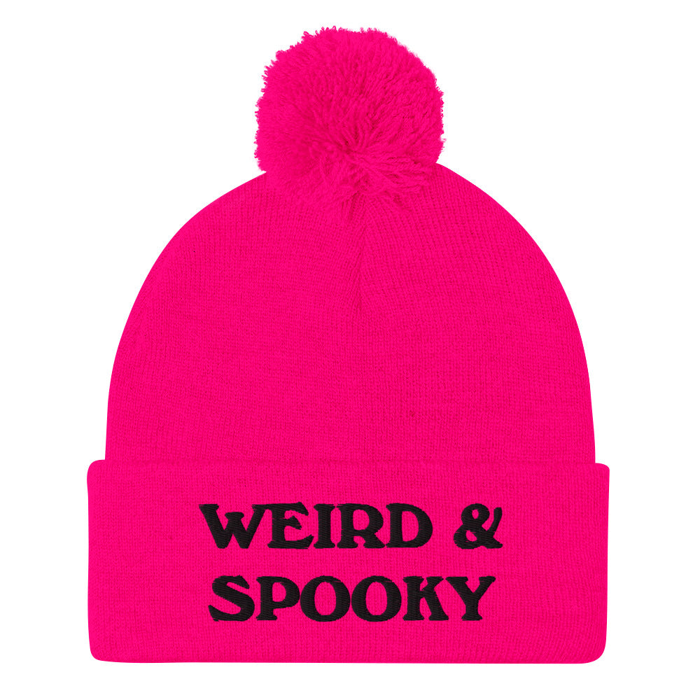 Pink and black weird and spooky beanie - Stay weird and spooky in this classic beanie with a pom pom on top. It's cute and cozy and just a little weird. So, celebrate your weirdness and individuality in our funky clothing and accessories. Be weird, be spooky, and be yourself in these colorful and unique beanies.