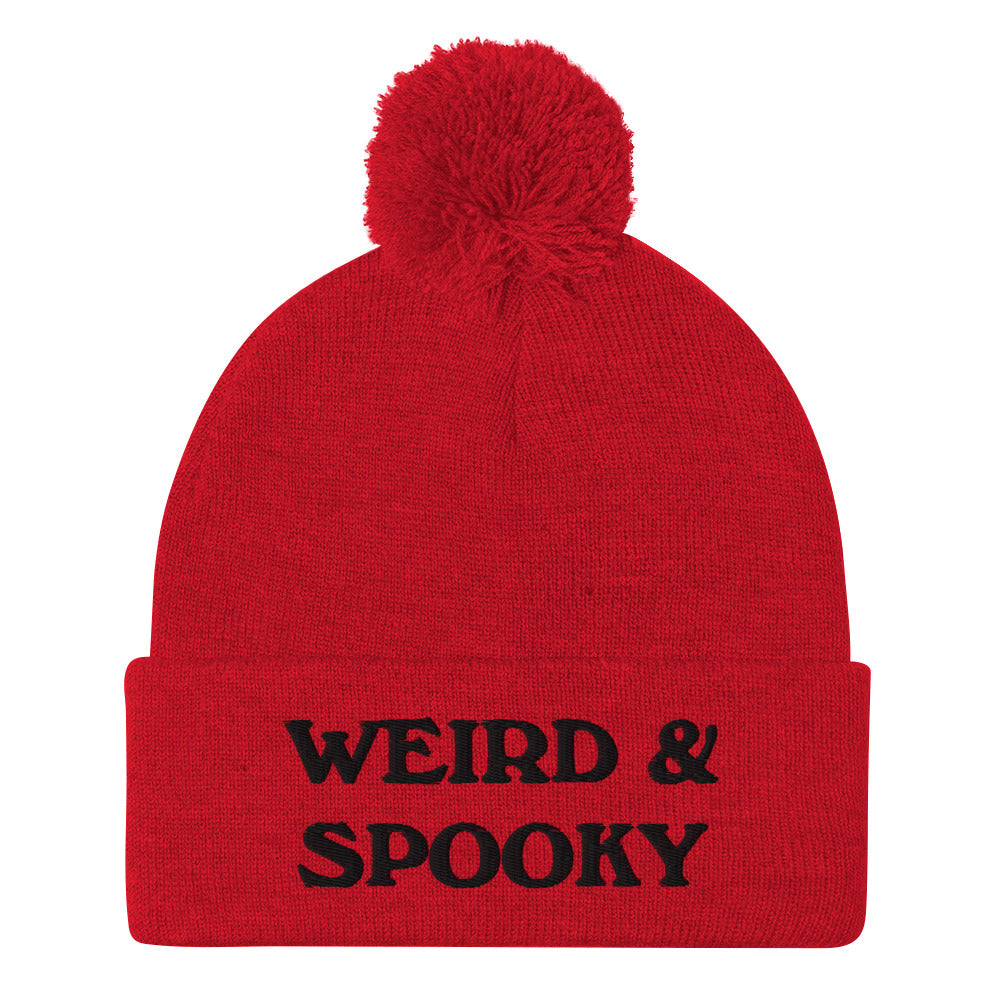 Black and red weird and spooky beanie - Stay weird and spooky in this classic beanie with a pom pom on top. It's cute and cozy and just a little weird. So, celebrate your weirdness and individuality in our funky clothing and accessories. Be weird, be spooky, and be yourself in these colorful and unique beanies.