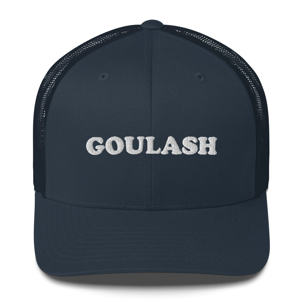 Navy blue trucker hat with a goulash embroidery. - This goulash trucker cap with a mesh back is a comfortable and unusual foodie hat for everyday. It's a classic trucker cap with a funny and unusual foodie embroidery. This funky trucker hat is perfect for people who love goulash. Celebrate your favorite foods in our funky foodie clothing and accessories.
