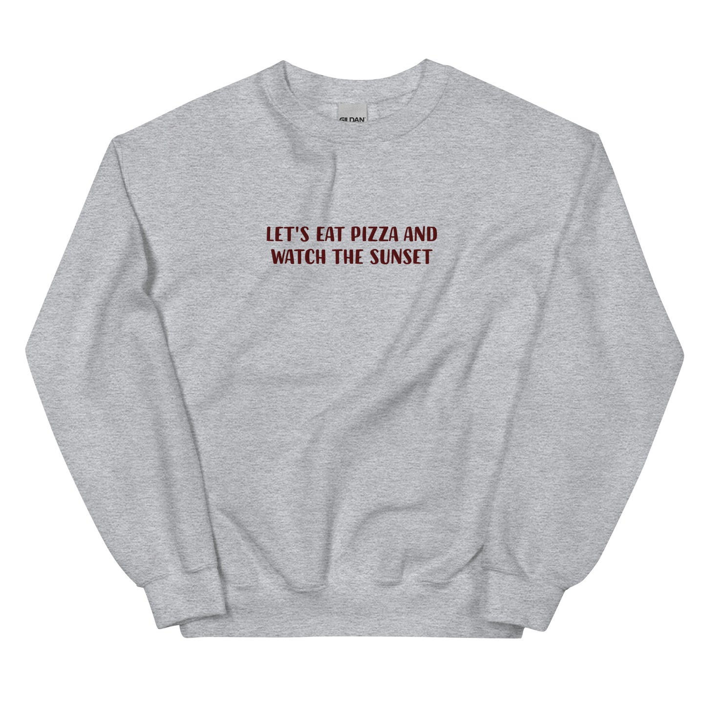 Funny light gray sweatshirt with cute saying about pizza and sunsets - Let's eat pizza and watch the sunset. This funny foodie sweatshirt is original, comfortable and made just for you. A unique embroidered sweatshirt for pizza lovers. It's the perfect weird sweatshirt for foodies, sunset chasers and pizza enthusiasts. Stay weird and celebrate your favorite foods in our funky foodie clothing.