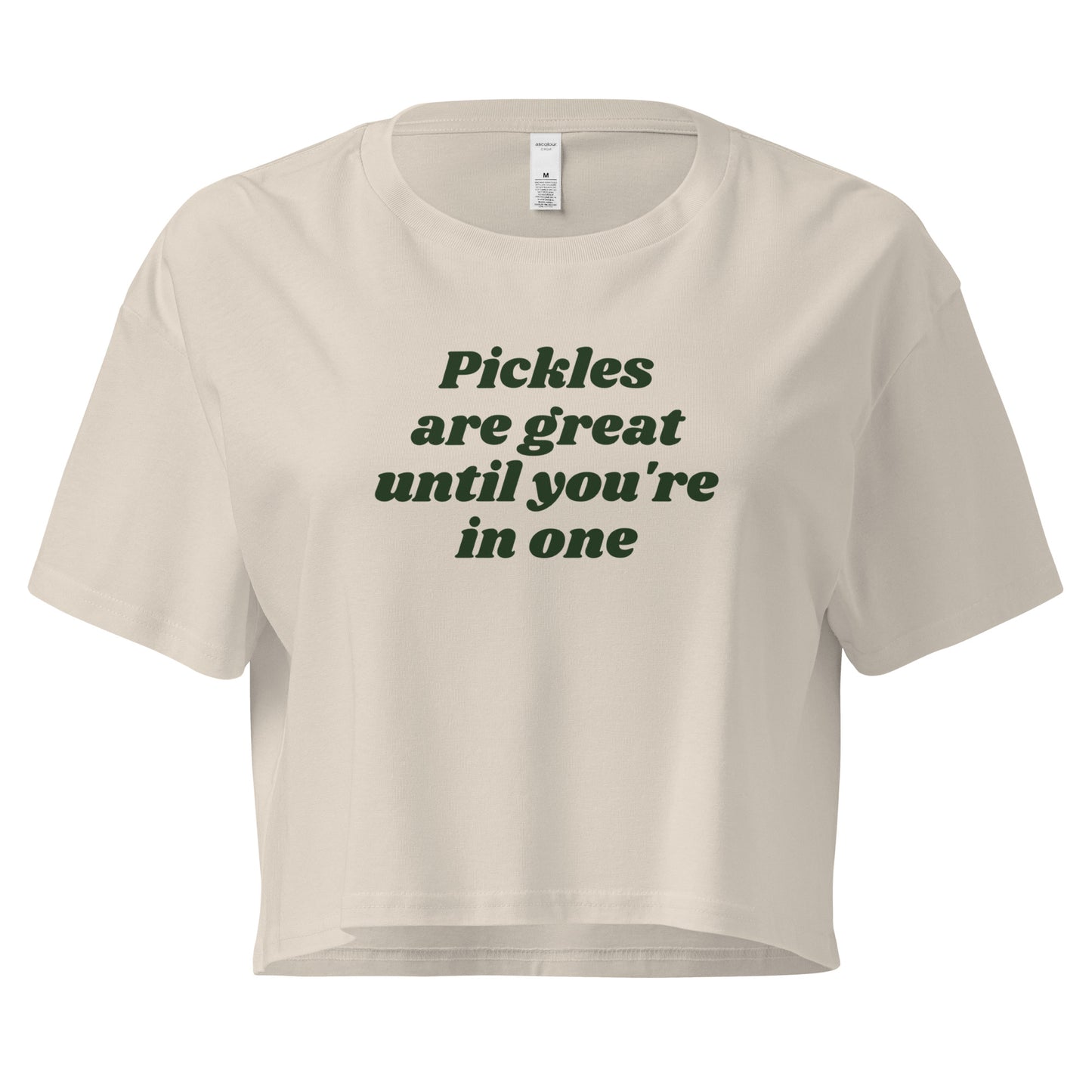 Bone color crop top with the text 'Pickles are great until you're in one' printed in green.