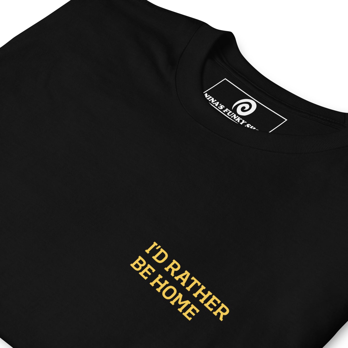 Black I'd Rather Be Home T-Shirt This "Id Rather Be Home T-shirt" is soft, comfortable and perfect for everyday introvert streetwear. It's a classic cotton tee with a funny saying, expertly printed on the front. Stand out in our sarcastic graphic tees and funny foodie apparel. Designed by Nina and made just for you.