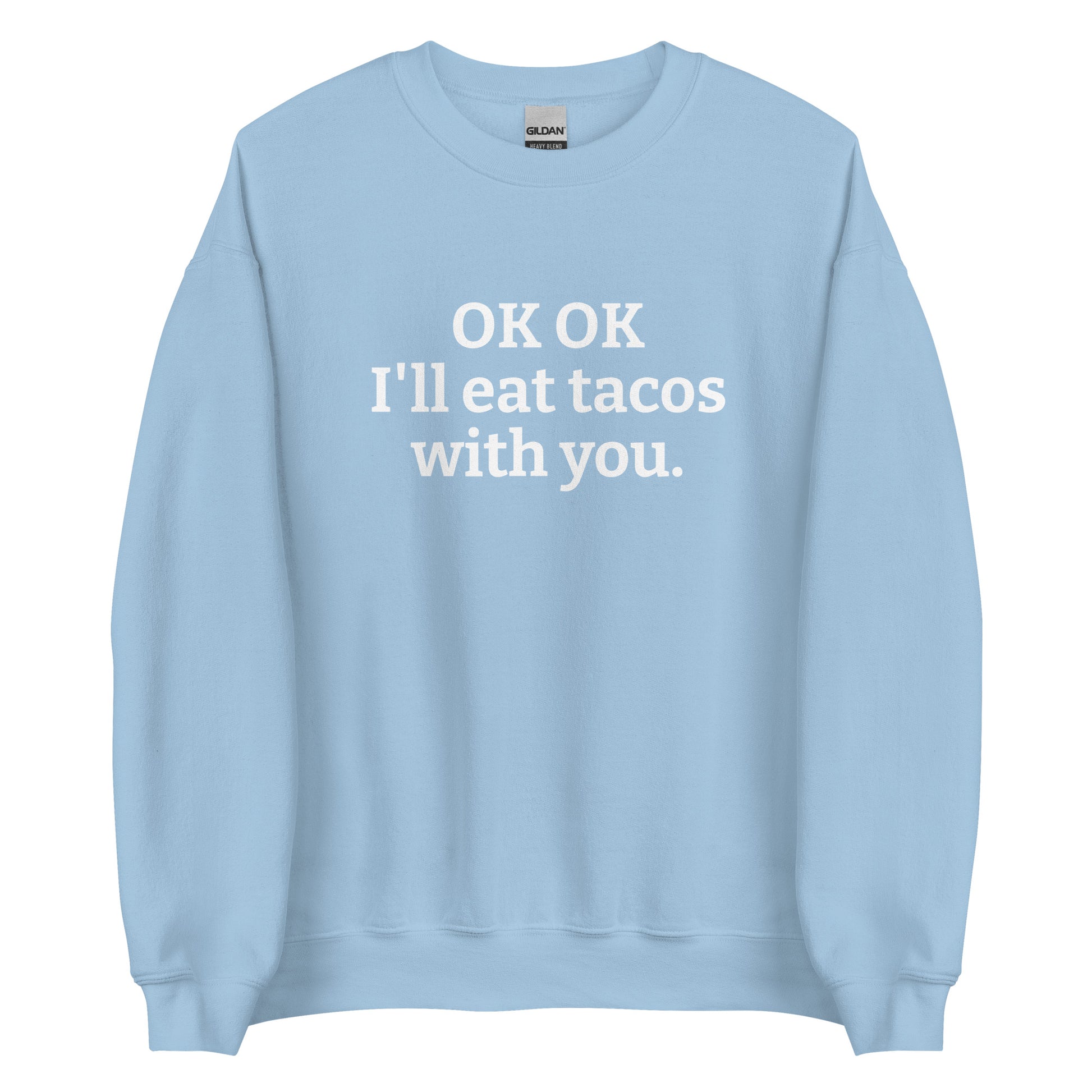 Light Blue OK OK I'll eat tacos with you Sweatshirt from Nina's Funky Shop by ninanush - Do you love tacos? Looking for a funny gift for a friend? Our taco lover crewneck sweatshirt is just what you need. It's a unisex taco sweatshirt with "OK OK I'll eat tacos with you." on the front. A funny taco sweatshirt for cozy nights in and quirky streetwear. This taco enthusiast sweatshirt is made just for you.