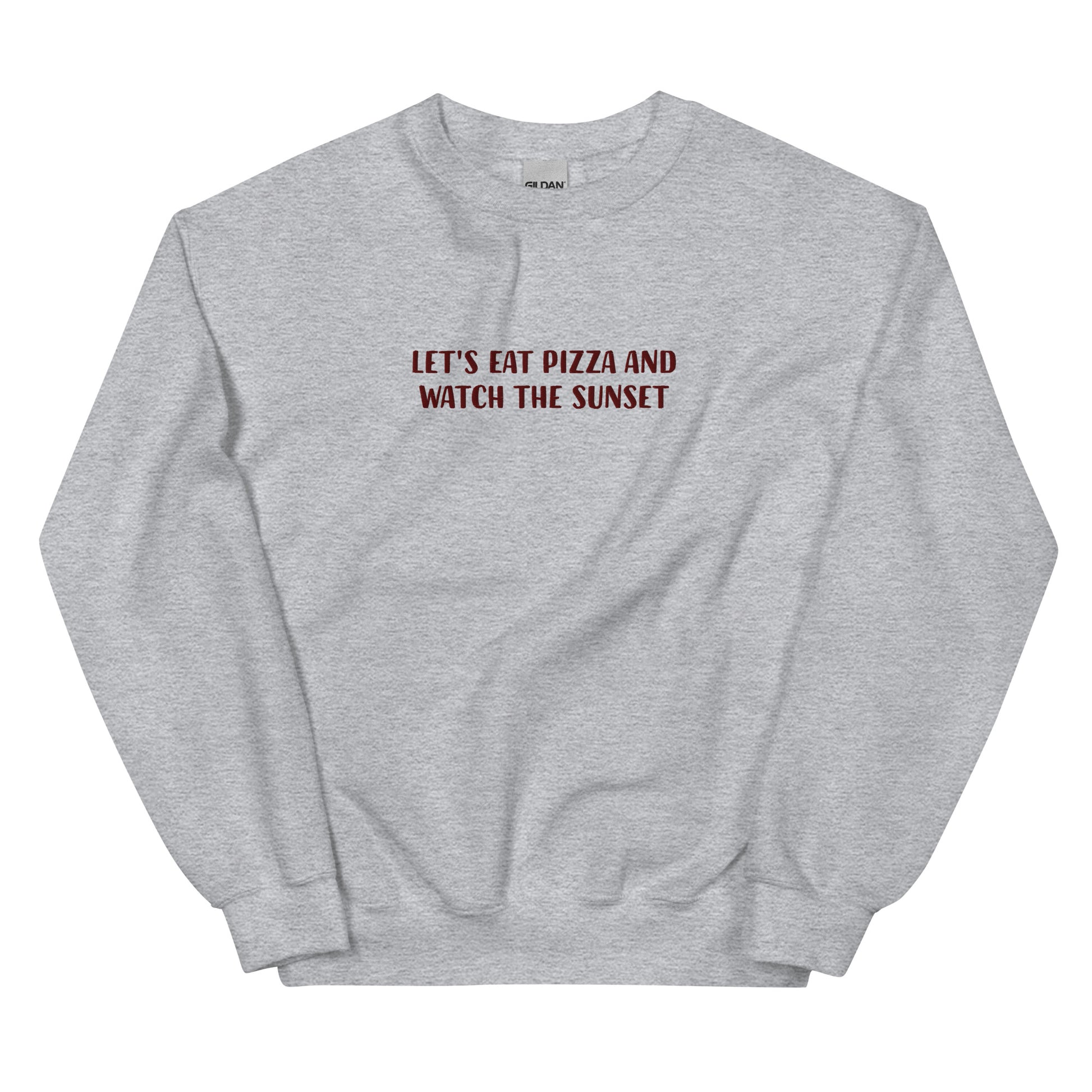Funny light gray sweatshirt with cute saying about pizza and sunsets - Let's eat pizza and watch the sunset. This funny foodie sweatshirt is original, comfortable and made just for you. A unique embroidered sweatshirt for pizza lovers. It's the perfect weird sweatshirt for foodies, sunset chasers and pizza enthusiasts. Stay weird and celebrate your favorite foods in our funky foodie clothing.